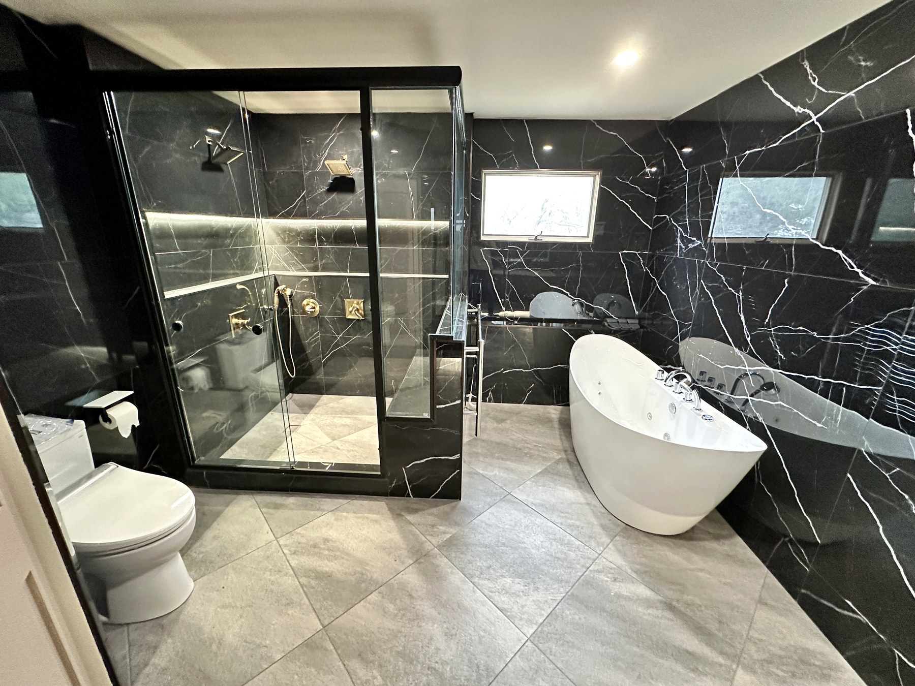 Black Marble Primary Bath by Classic Touch Designs