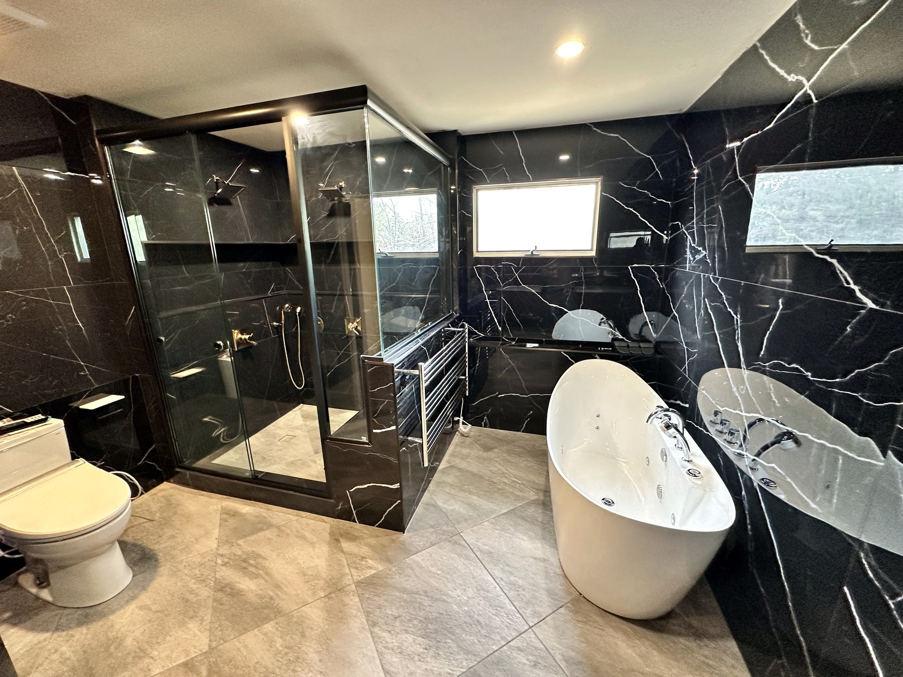 Black Marble Primary Bath by Classic Touch Designs